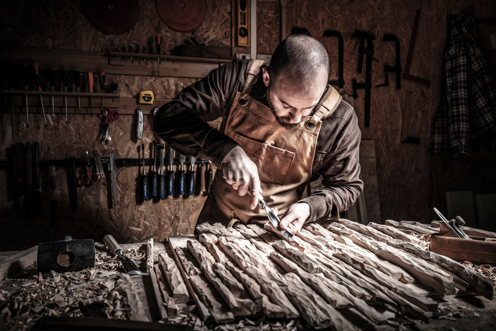 Carpenter Carving Wood